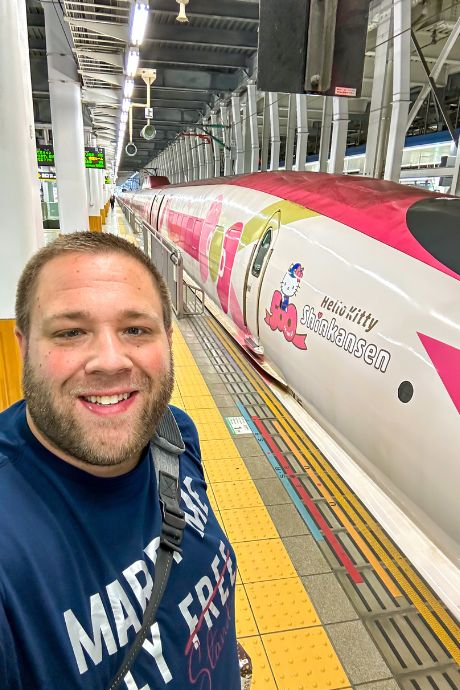 The name of the train is on the front before the beginning of the iconic pink ribbon