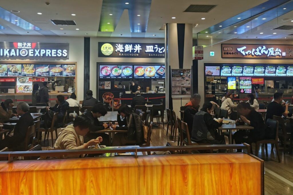 The food court area at DiverCity Plaza has a large variety of eating options