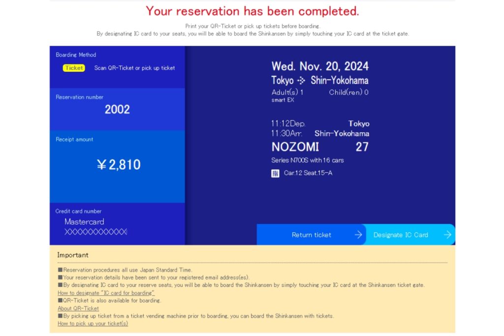 The image displays a completed reservation confirmation screen for a Shinkansen train trip. The top section states "Your reservation has been completed" in red text, with instructions to print a QR-Ticket or pick up the physical ticket before boarding. Trip details show a departure from Tokyo at 11:12 AM and arrival in Shin-Yokohama at 11:30 AM on November 20, 2024, on the Nozomi 27 train (Ordinary Car 12, Seat 15-A). The total cost is ¥2,810, paid via Mastercard. The reservation number is 2002. The bottom section contains important notes about QR-Ticket boarding, designating an IC card, and ticket collection procedures. Options to "Return ticket" or "Designate IC Card" are visible on the right.