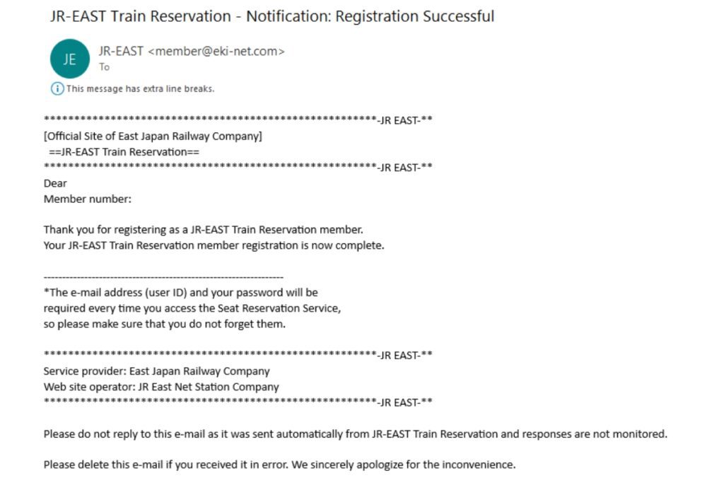 Email from JR-EAST Train Reservation confirming successful member registration. The message thanks the recipient for registering and states that the registration is complete. It reminds the user to retain their email address (user ID) and password for accessing the Seat Reservation Service. The email is labeled as automatically sent and instructs recipients not to reply. Contact details for the service provider, East Japan Railway Company, and JR East Net Station Company are included.