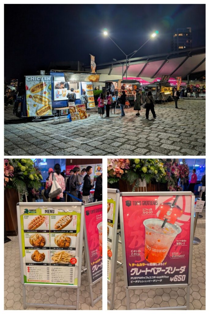 A collage of three images showing a night food market outside the Yoyogi National Stadium Second Gymnasium for a Tokyo Great Bears volleyball game: the top image features brightly lit food trucks serving items like fried chicken and sweet potatoes, with people lined up under overhead lights; the bottom left displays a menu board with Korean-style hot dogs, chicken, and fries from Vortex Kitchen; and the bottom right shows a promotional sign for a colorful “Great Bears Soda” with team branding and fruit-flavored jelly.